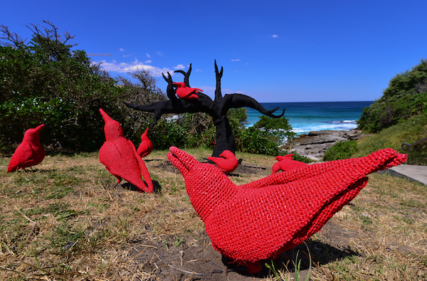Mikaela Castledine, east of the mulberry tree- the legend of the ten red crows, Sculpture by the Sea, Bondi 2013. Photo Clyde Yee