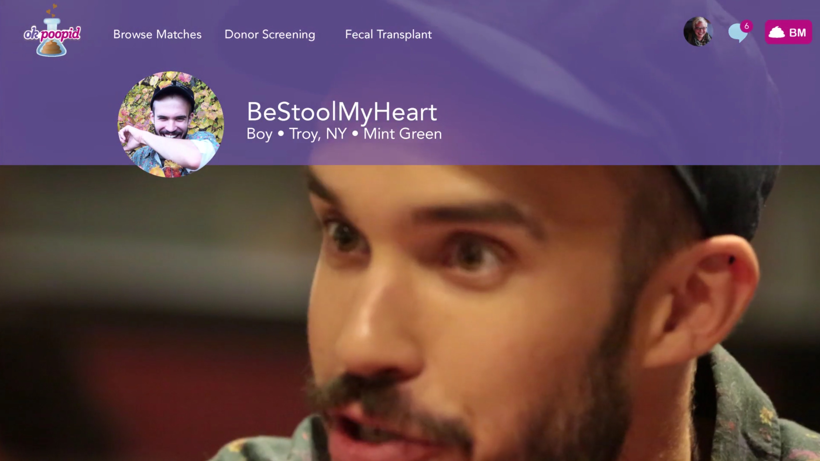 Screenshot of a dating site with branding OKPoopid