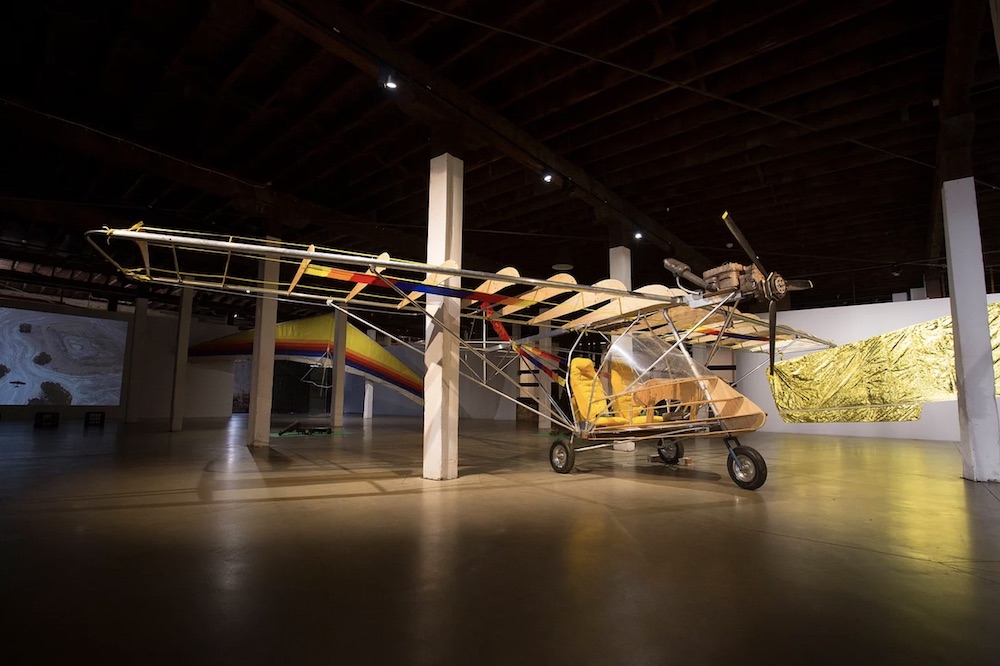 A model of a light plane, in a gallery space