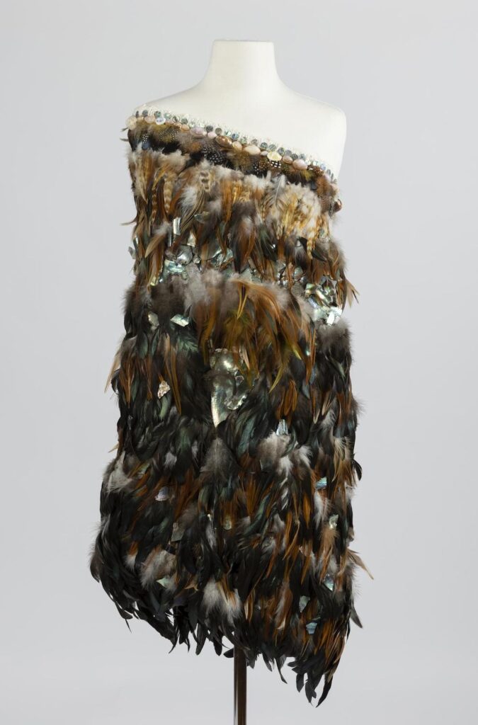 Lani Robinson's work for 'The West Australian Pulse: 2022' is a dress made of feathers and shells.