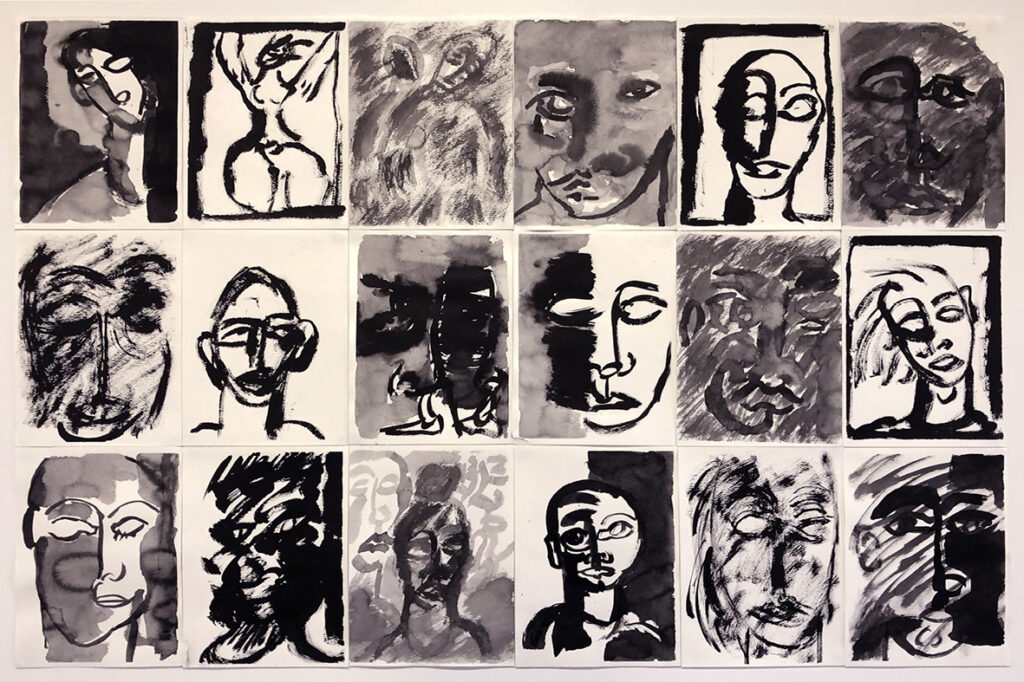 A series of black and white depictions of faces, in Indian ink on paper. The faces are abstract and the features are distorted, almost Picasso-style.